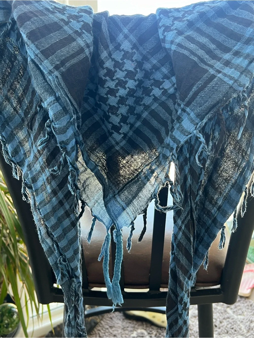 Eight scarves of various colors and styles